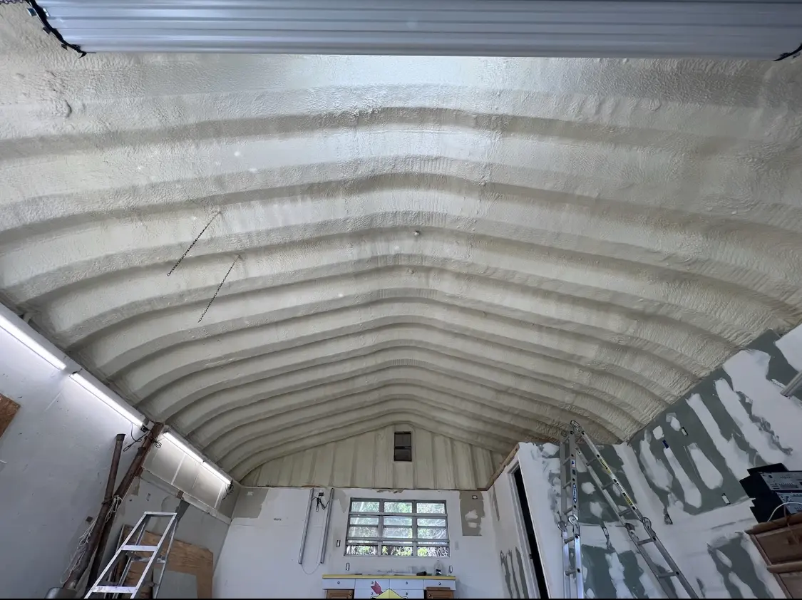 Spray polyurethane foam applied to the underside of a metal roof deck in Marbletown